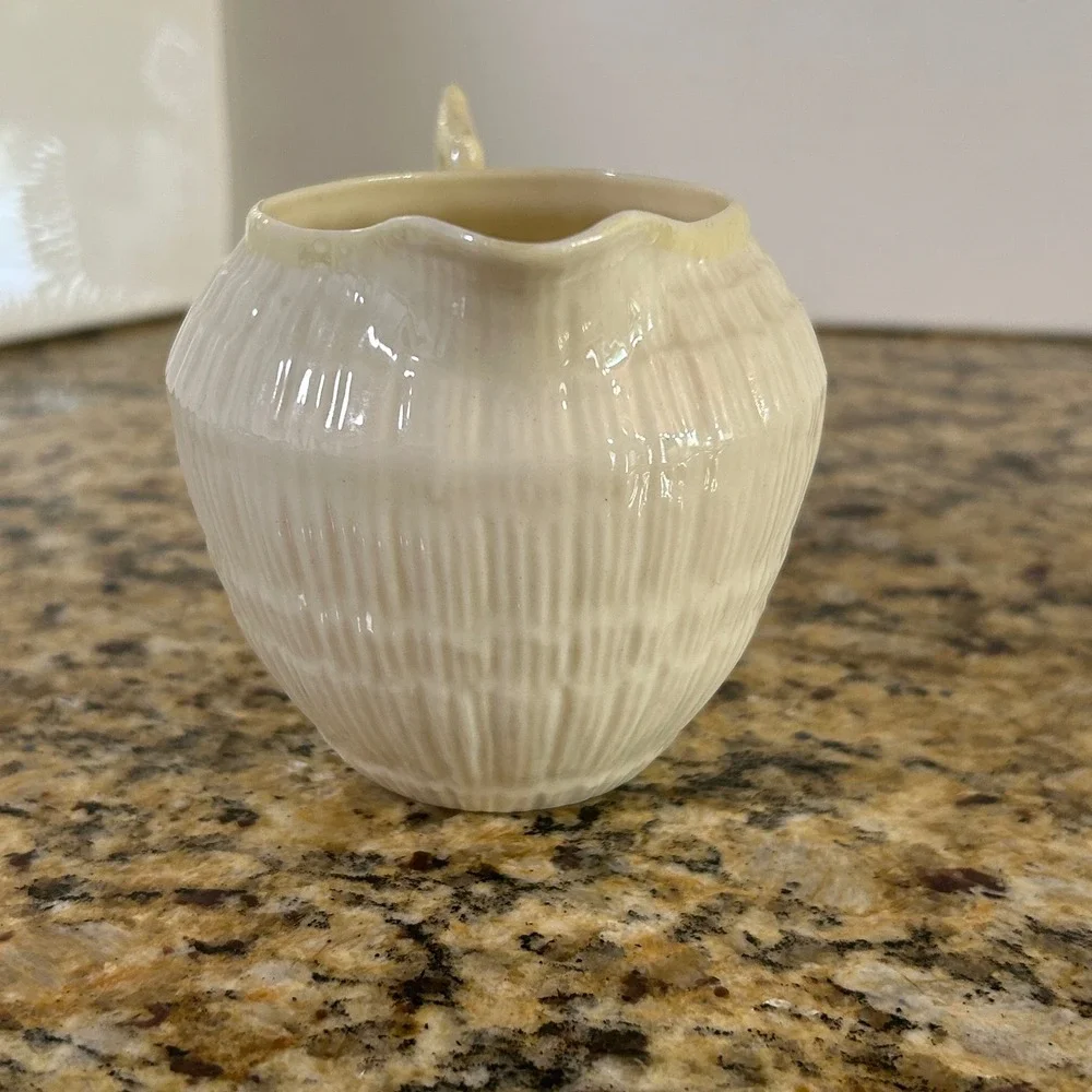 Belleek Neptune Creamer 3.25in Ivory Yellow Shell Pattern Coral Handle Vintage